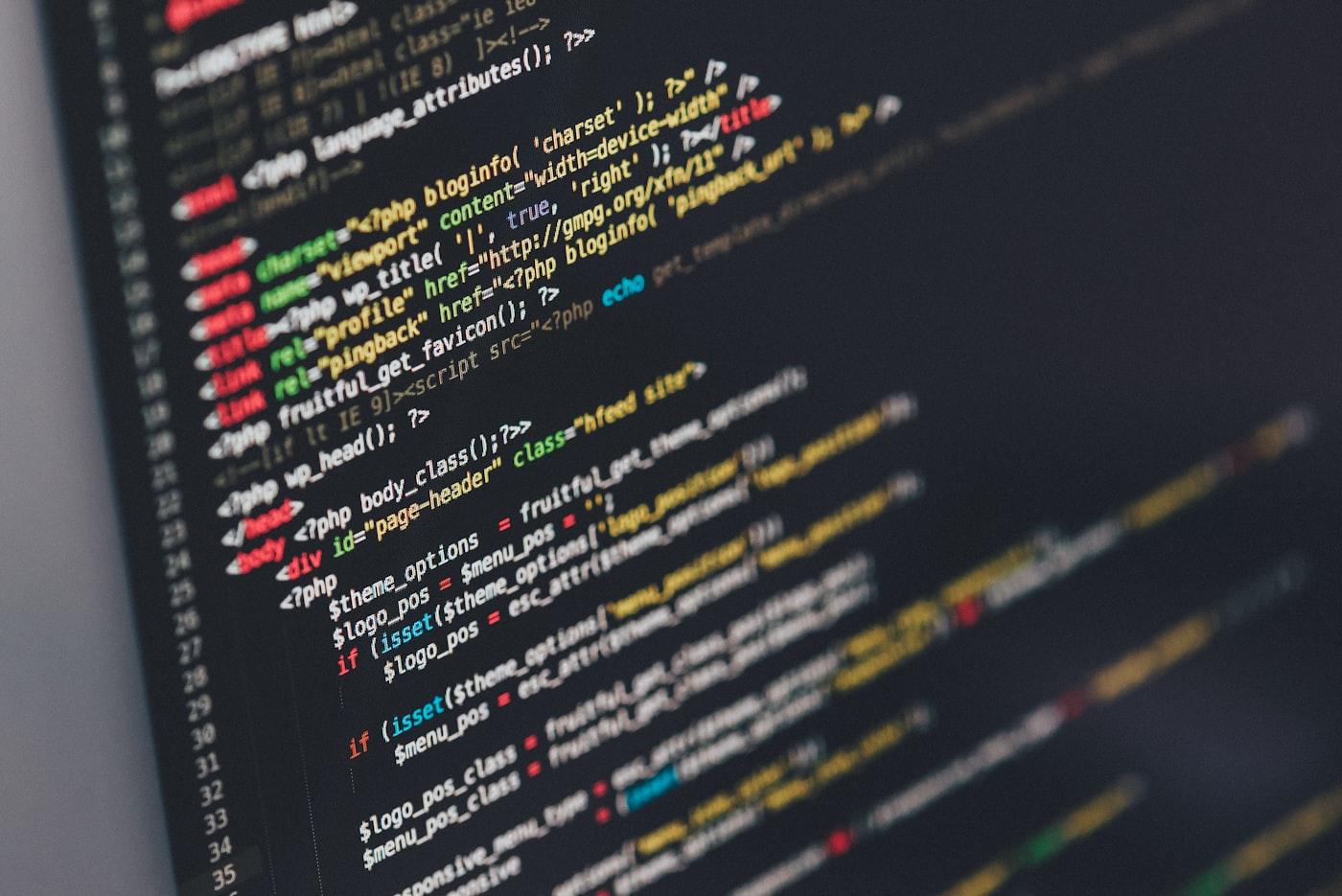 Developer workstation with code open for toolkit and audit standards work
